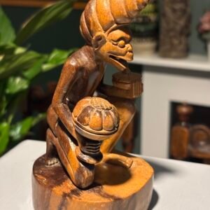 Vintage Indonesian folk art, hand carved wooden figure.