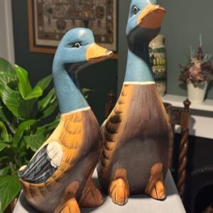 A fun pair of vintage hand-painted wooden mallard duck ornaments.