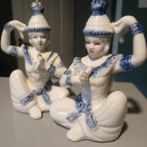 A pair of vintage Siamese, Thai temple dancers.