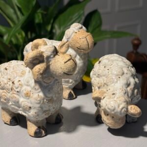 A beautiful family of 3 Stoneware Pottery Sheep.